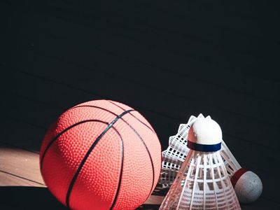 Close up of sports equipment on a dark floor